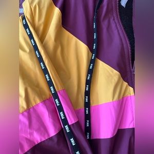 A Victoria secret jacket, multi color, size m/l fits like a large